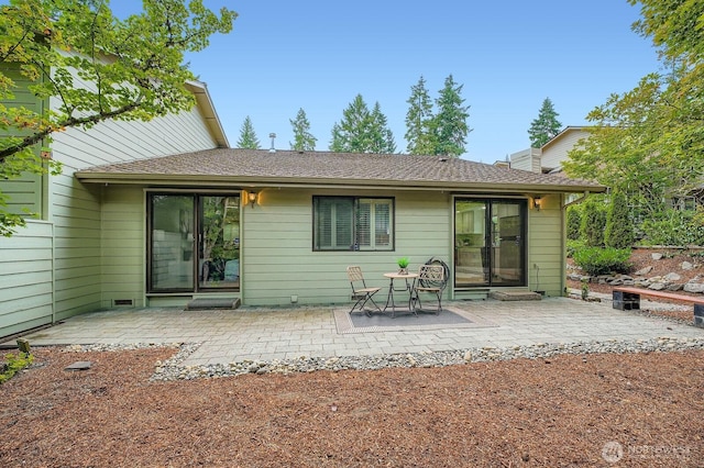 16142 SE 33rd Ln, Unit Bellevue, WA 98008 - back of house featuring a patio area and roof with shingles