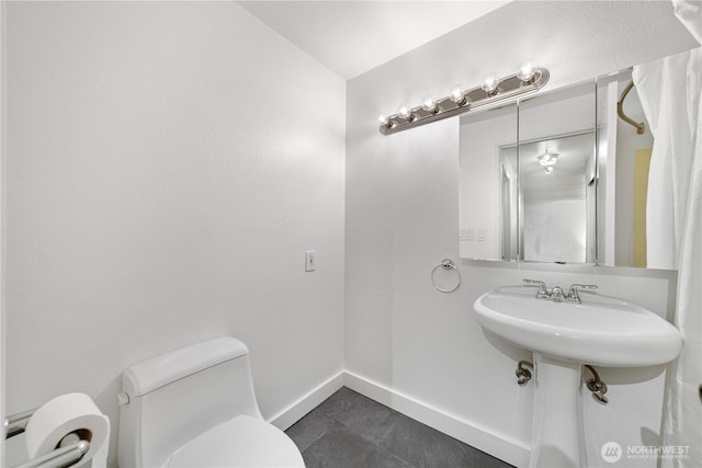 7021 Sand Point Way NE Unit B201, Seattle, WA 98115 - bathroom with toilet and tile patterned flooring