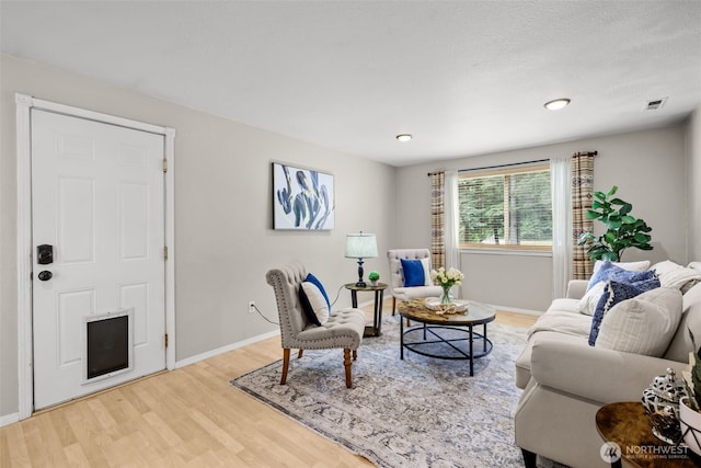 19221 Patterson Rd E, Orting, WA 98360 - living room with light wood-style floors and baseboards