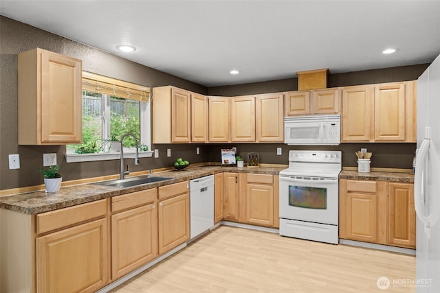 19221 Patterson Rd E, Orting, WA 98360 - kitchen featuring white appliances, light brown cabinetry, light wood-style floors, and recessed lighting
