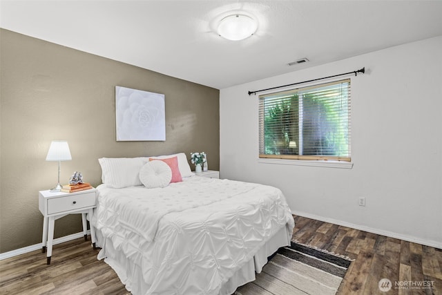 19221 Patterson Rd E, Orting, WA 98360 - bedroom featuring wood finished floors and baseboards