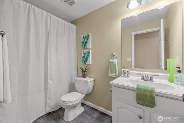 19221 Patterson Rd E, Orting, WA 98360 - full bath with vanity and wood finished floors