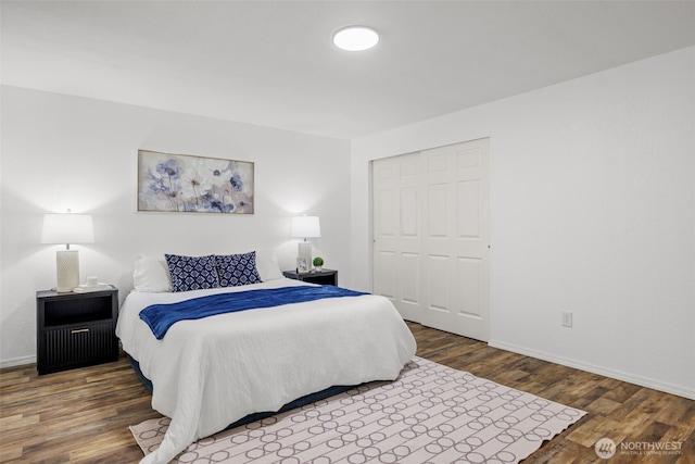 19221 Patterson Rd E, Orting, WA 98360 - bedroom with wood finished floors and a closet