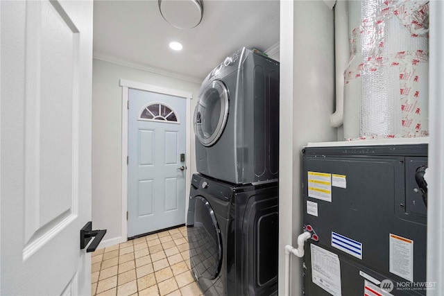 4248 A St SE Unit 423, Auburn, WA 98002 - washroom with stacked washer / drying machine, crown molding, light tile patterned flooring, and recessed lighting