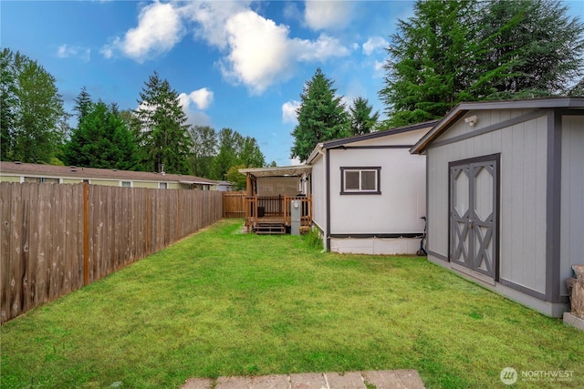 4248 A St SE Unit 423, Auburn, WA 98002 - fenced yard with a deck