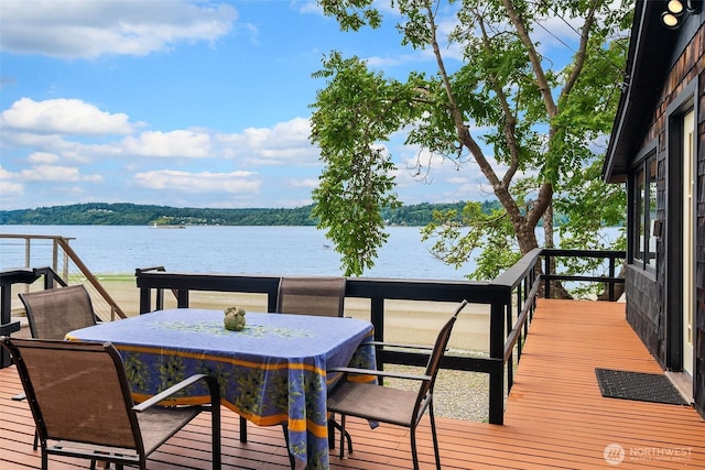 11212 SW 125th St, Vashon, WA 98070 - deck with a water view and outdoor dining space