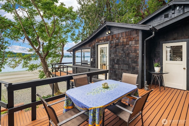 11212 SW 125th St, Vashon, WA 98070 - wooden deck featuring a water view and outdoor dining area