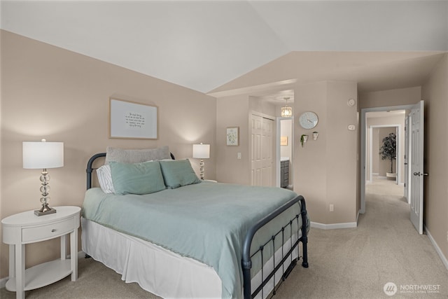 23501 112th Ave SE Unit F103, Kent, WA 98031 - bedroom with light colored carpet, vaulted ceiling, and a closet