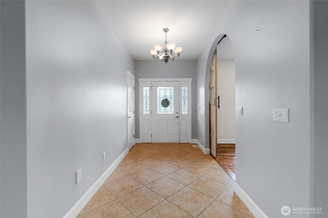 10 Legacy Ln, Elma, WA 98541 - foyer with a chandelier, light tile patterned flooring, and arched walkways