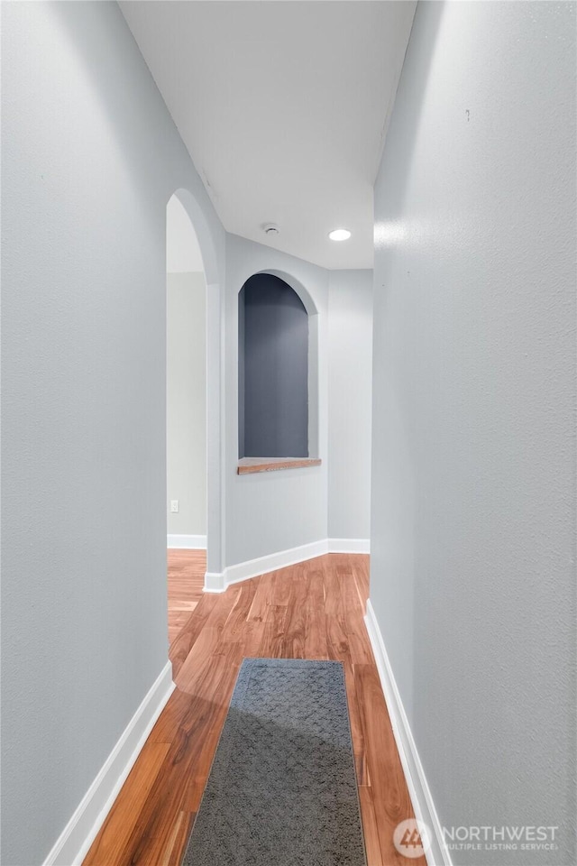 10 Legacy Ln, Elma, WA 98541 - hallway with wood finished floors, recessed lighting, and arched walkways