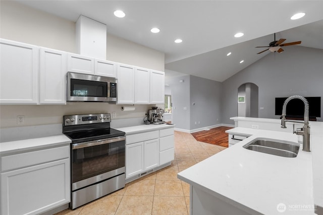 10 Legacy Ln, Elma, WA 98541 - kitchen featuring appliances with stainless steel finishes, open floor plan, recessed lighting, a ceiling fan, and white cabinetry