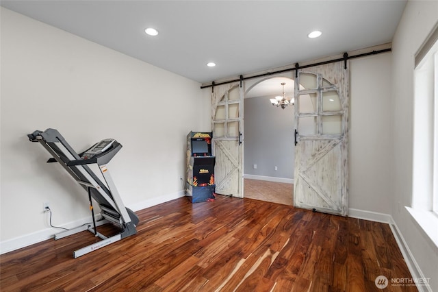 10 Legacy Ln, Elma, WA 98541 - workout area featuring a barn door, wood finished floors, recessed lighting, and a chandelier