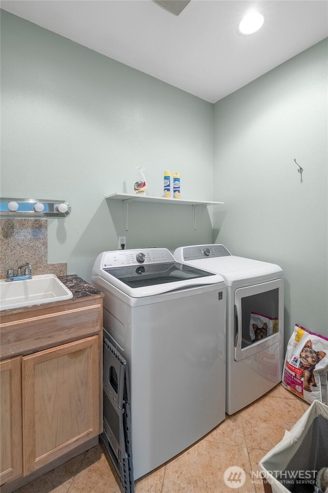 10 Legacy Ln, Elma, WA 98541 - laundry room featuring separate washer and dryer and cabinet space