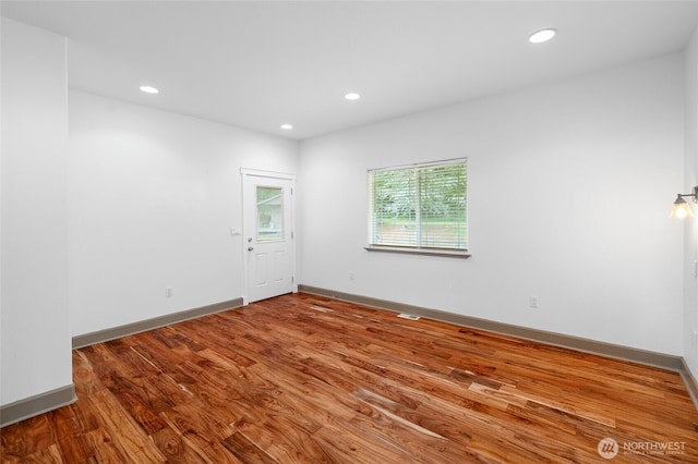 10 Legacy Ln, Elma, WA 98541 - unfurnished room featuring wood finished floors and recessed lighting
