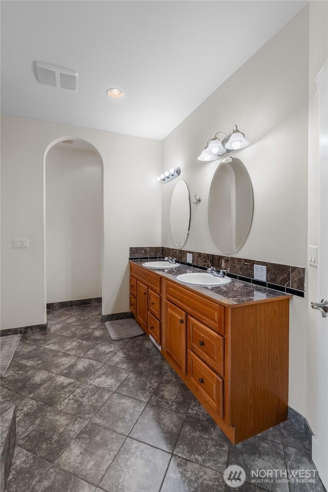 10 Legacy Ln, Elma, WA 98541 - bathroom featuring double vanity and baseboards