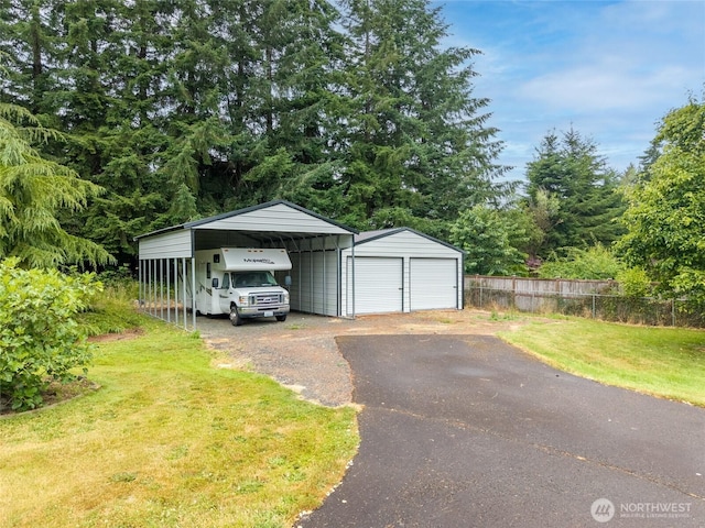 10 Legacy Ln, Elma, WA 98541 - garage featuring a detached garage and a detached carport