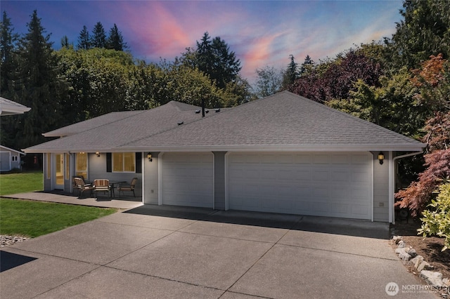 7104 84th St E, Puyallup, WA 98371 - single story home with driveway, a garage, a yard, and roof with shingles