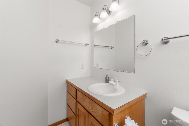 7104 84th St E, Puyallup, WA 98371 - bathroom featuring vanity and toilet