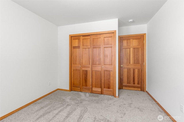 7104 84th St E, Puyallup, WA 98371 - unfurnished bedroom with carpet floors and a closet
