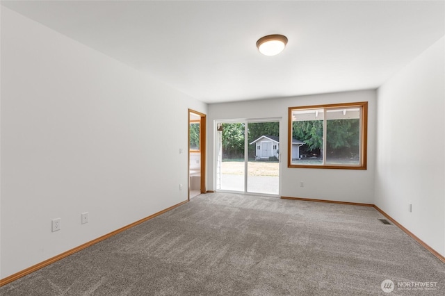 7104 84th St E, Puyallup, WA 98371 - unfurnished room with carpet floors and baseboards