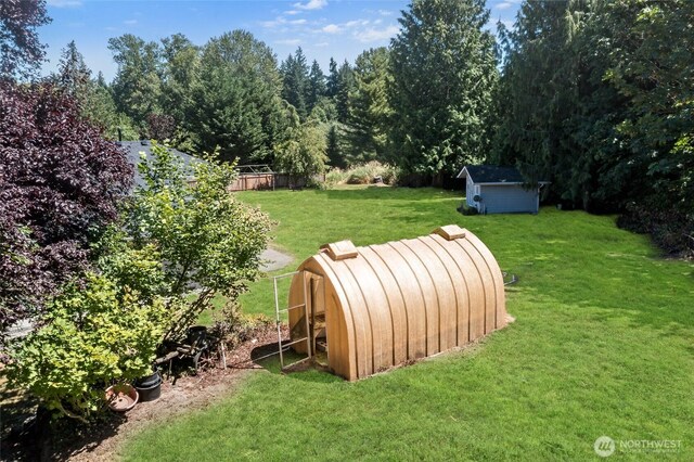 7104 84th St E, Puyallup, WA 98371 - view of green lawn featuring a storage unit
