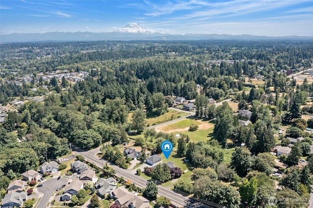 7104 84th St E, Puyallup, WA 98371 - drone / aerial view of a forest and mountains
