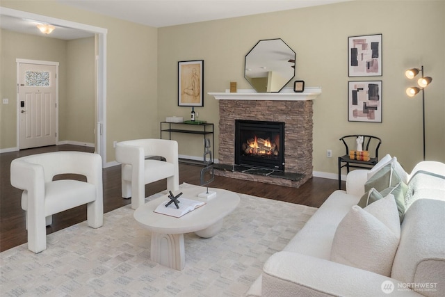 15230 Kayla St SE, Yelm, WA 98597 - living room with wood finished floors and a stone fireplace