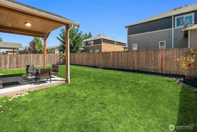 15230 Kayla St SE, Yelm, WA 98597 - fenced backyard with a patio