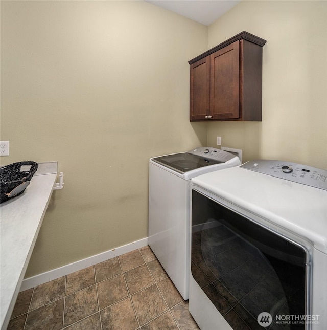 15230 Kayla St SE, Yelm, WA 98597 - laundry room featuring cabinet space and washer and dryer