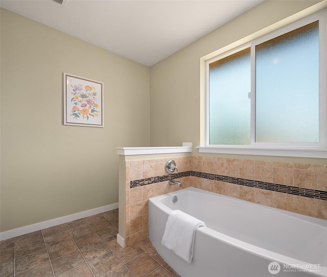 15230 Kayla St SE, Yelm, WA 98597 - full bathroom featuring a garden tub and baseboards