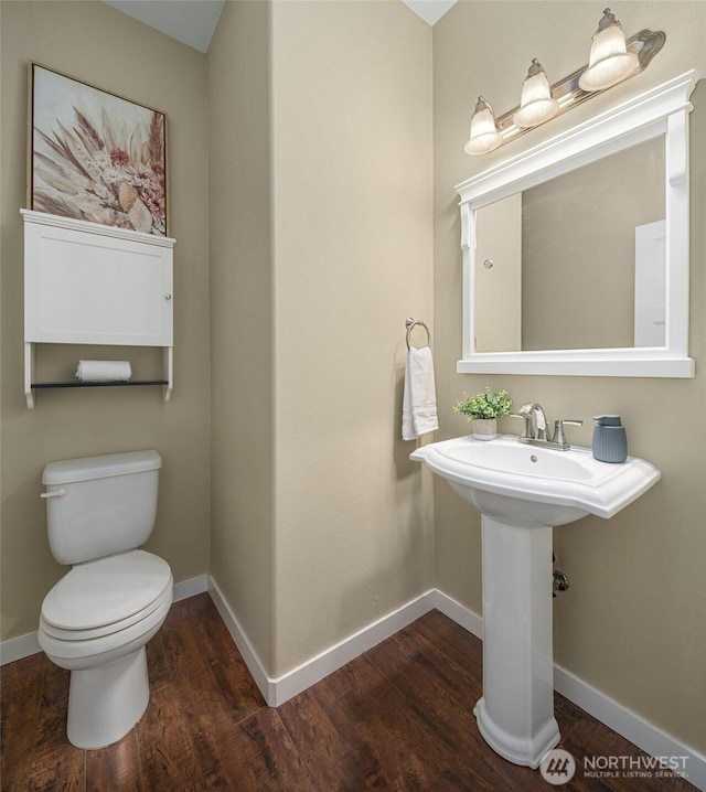 15230 Kayla St SE, Yelm, WA 98597 - bathroom with wood finished floors and toilet