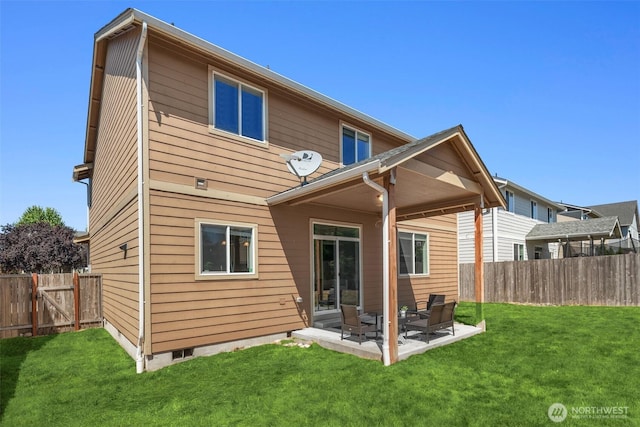 15230 Kayla St SE, Yelm, WA 98597 - rear view of house featuring a fenced backyard and a patio