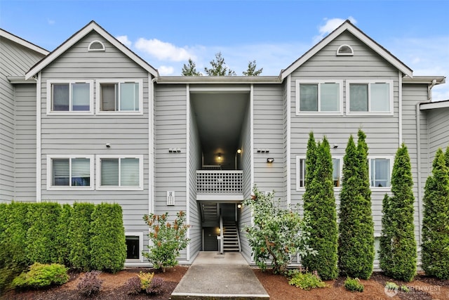 12618 109th Ct NE Unit H102, Kirkland, WA 98034 - view of building exterior featuring stairway