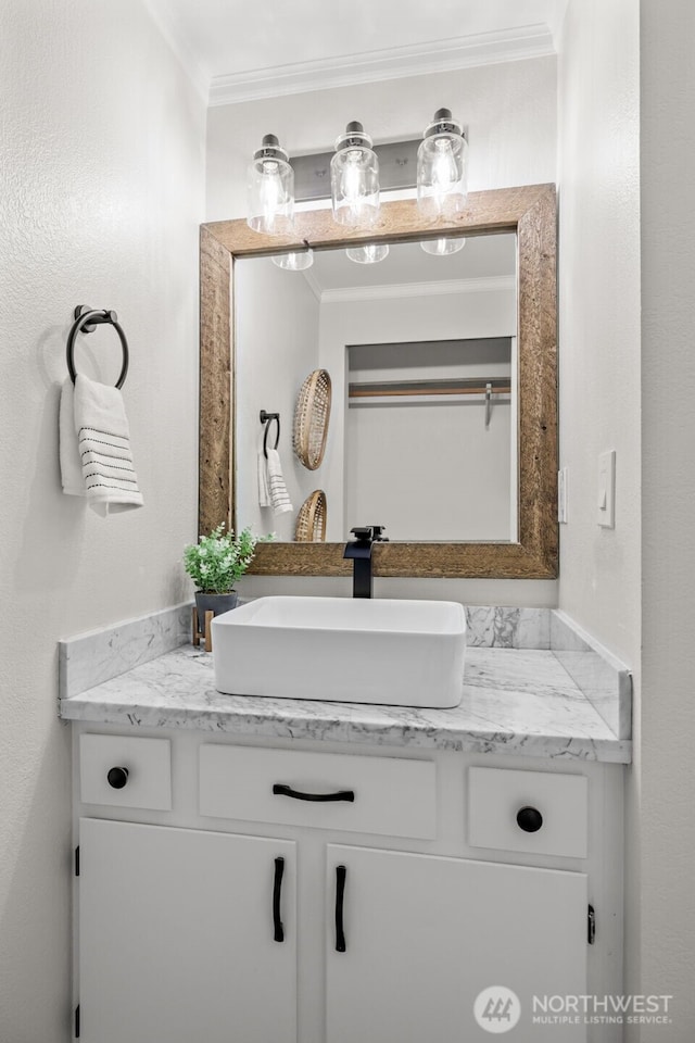 12618 109th Ct NE Unit H102, Kirkland, WA 98034 - bathroom with crown molding and vanity
