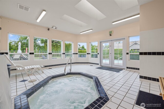 12618 109th Ct NE Unit H102, Kirkland, WA 98034 - view of pool with a hot tub and french doors