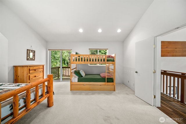 18725 River Rd, Leavenworth, WA 98826 - bedroom featuring vaulted ceiling, access to exterior, recessed lighting, and carpet flooring