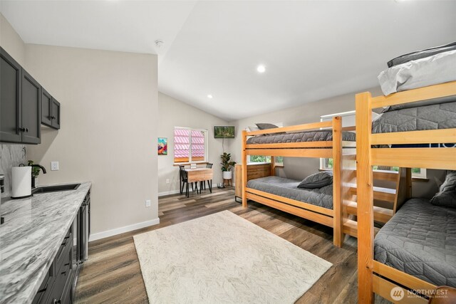 18725 River Rd, Leavenworth, WA 98826 - bedroom with vaulted ceiling, dark wood-style flooring, and recessed lighting
