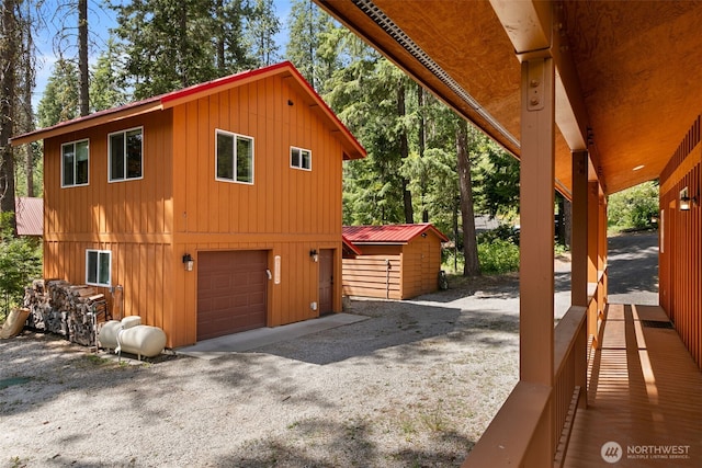 18725 River Rd, Leavenworth, WA 98826 - view of side of property featuring a garage and board and batten siding
