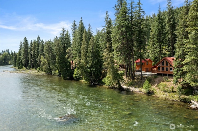 18725 River Rd, Leavenworth, WA 98826 - water view with a heavily wooded area