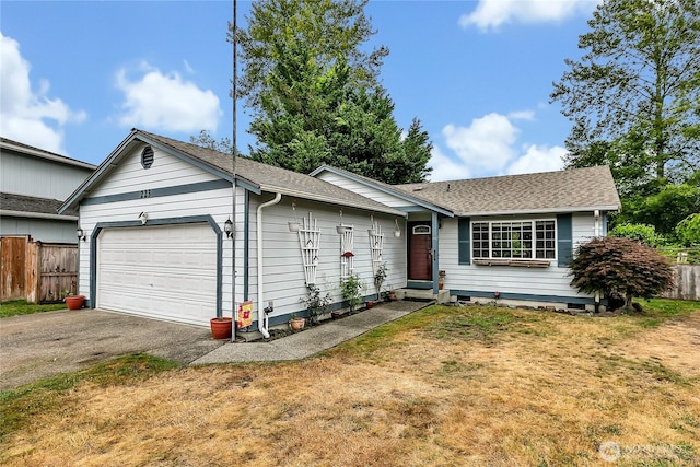223 Nugget Rd, Gold Bar, WA 98251 - ranch-style home featuring an attached garage, asphalt driveway, and roof with shingles