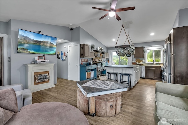 223 Nugget Rd, Gold Bar, WA 98251 - living area featuring light wood-style floors, vaulted ceiling, a ceiling fan, and recessed lighting
