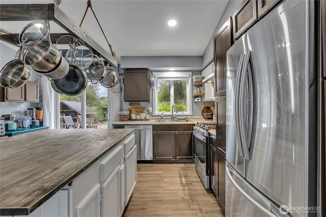 223 Nugget Rd, Gold Bar, WA 98251 - kitchen with stainless steel appliances, light wood-type flooring, and recessed lighting