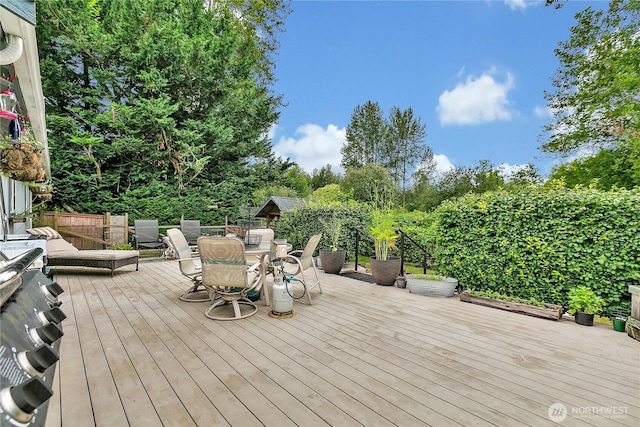 223 Nugget Rd, Gold Bar, WA 98251 - wooden deck featuring outdoor dining space