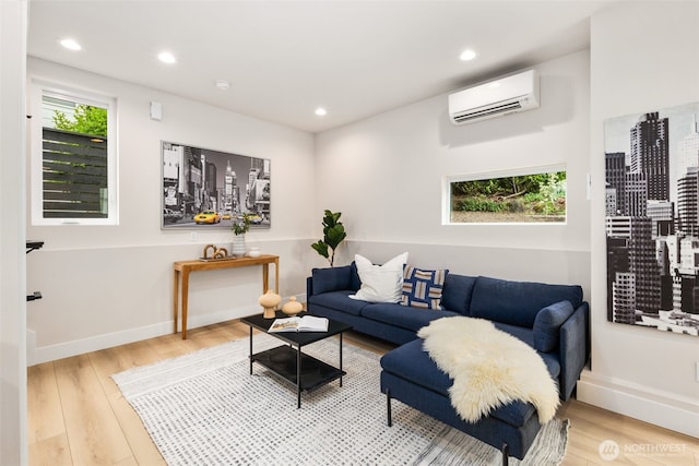 9692 51st Ave S, Seattle, WA 98118 - living room with a wall mounted AC, wood finished floors, and recessed lighting