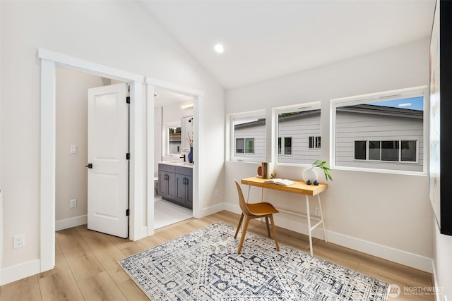 9692 51st Ave S, Seattle, WA 98118 - home office featuring light wood finished floors, vaulted ceiling, and recessed lighting