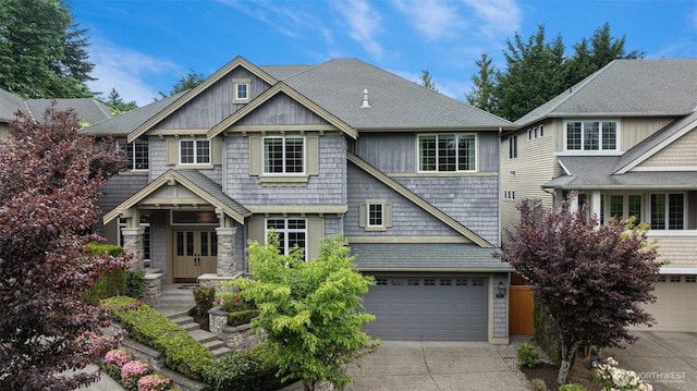 4569 162nd Ln SE, Bellevue, WA 98006 - craftsman-style house featuring an attached garage, concrete driveway, and roof with shingles