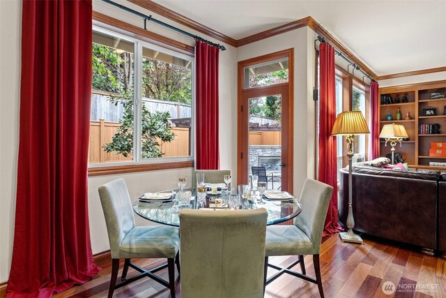4569 162nd Ln SE, Bellevue, WA 98006 - dining area featuring crown molding and wood finished floors