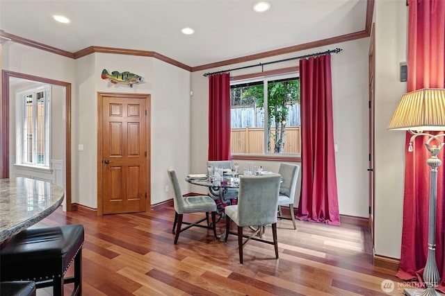 4569 162nd Ln SE, Bellevue, WA 98006 - dining space featuring wood finished floors, ornamental molding, and recessed lighting