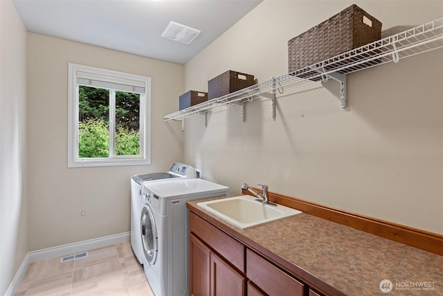 4569 162nd Ln SE, Bellevue, WA 98006 - washroom with separate washer and dryer and cabinet space
