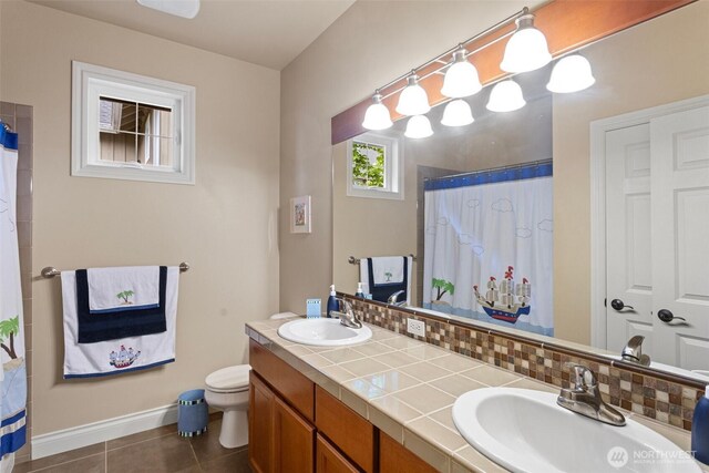 4569 162nd Ln SE, Bellevue, WA 98006 - full bathroom featuring double vanity, tile patterned floors, and a shower with curtain